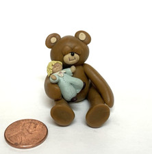 DOLLHOUSE MINIATURE POLYMER CLAY TEDDY HOLDING A GIRL DOLL