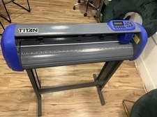 USCutter 28in. Titan Vinyl Cutter/Plotter with Stand Basket and materials
