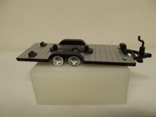 M2 - 164th Scale - Box Set Loose - Black Car Hauling Trailer W Moon Hubcaps
