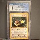 CGC 9 Eevee 55/82 Team Rocket 1st Edition Pokemon Card English 2000