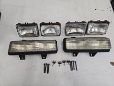 DUAL HEADLIGHT BUCKETS RETAINERS LAMPS BLINKER CHEVY GMC SUBURBAN BLAZER 89-91