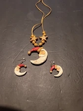 Vintage Wood Carved  Santa's Cresent Necklace And Matching Earrings.