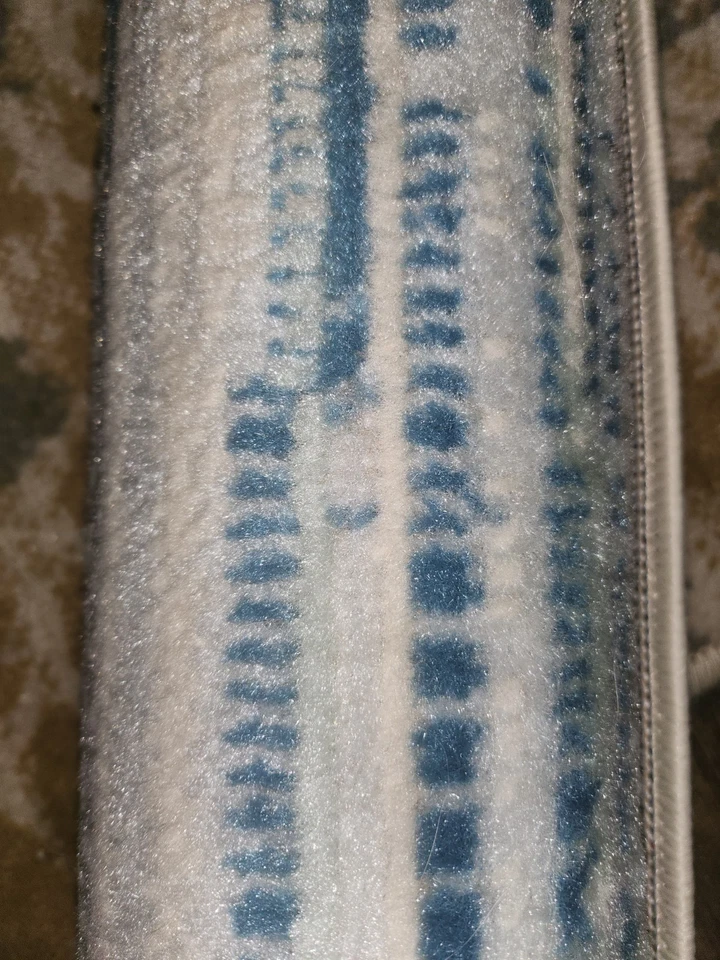 Alfombra interior moderna azul polipropileno Nourison Jubilant 5'3" x 7'3" Foto 3 de 4