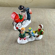 Dept 56 Snow Village Figurine Set – Mother w/ Baby Carriage + Kids Playing w/ Bo
