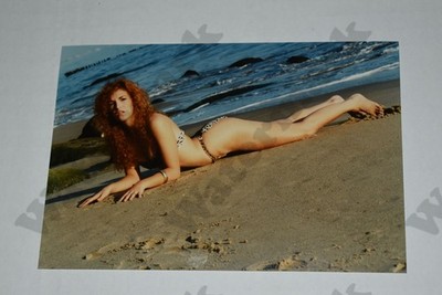 beach scene curvy redhead woman in bikini laying on sand Vintage Found Photo Na
