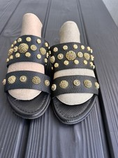 Black metallic leather clogs from Grey Mer.