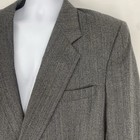 Grey vintage Christian Dior Monsieur suit jacket size 44 with notch lapels, front button closure, and two front flap pockets.
