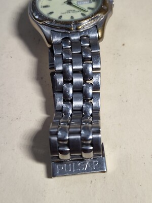 Pulsar Mens V733-9a30 Stainl Day DSTE Indicator Bed of Rice Quartz