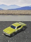 Hot Wheels Blackwall Army Staff Car Olds 442. Nice survivor, rolls good