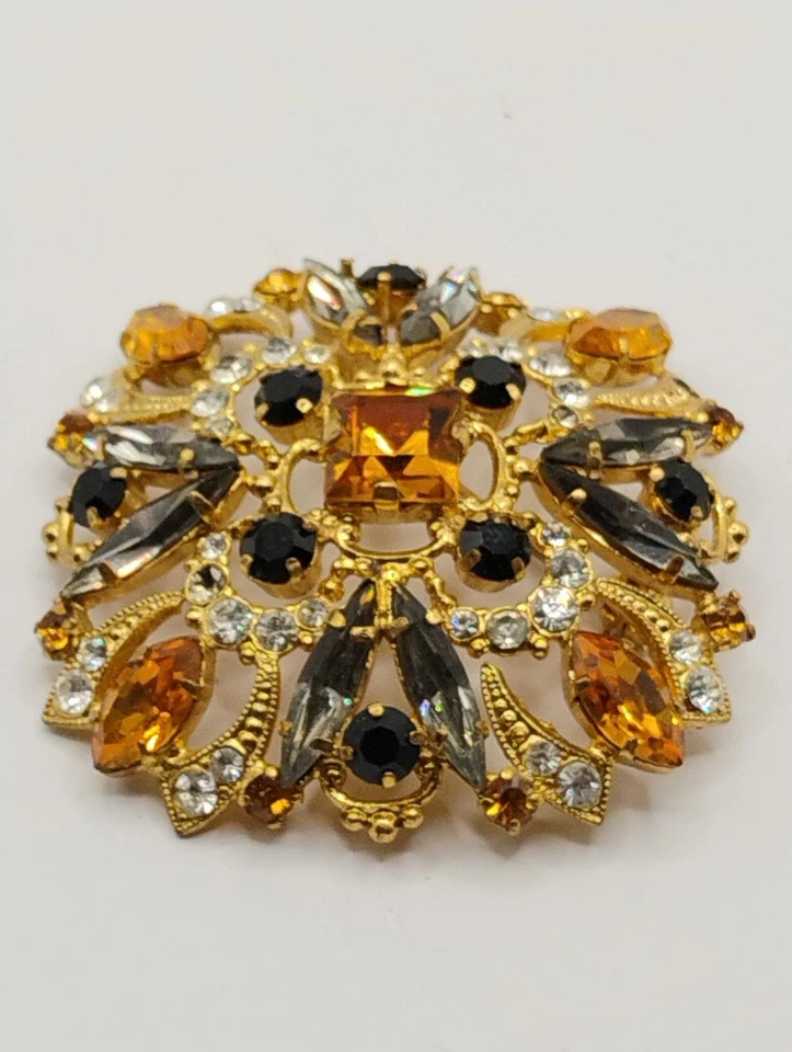 Broche prendedor vintage de cristal austriaco tono dorado con pedrería ámbar negro 2" Foto 3 de 4
