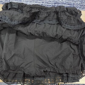 Gacaky Lace Trim Mini Ruffle Flowy Black Babydoll Dress Romper Built-in-shorts