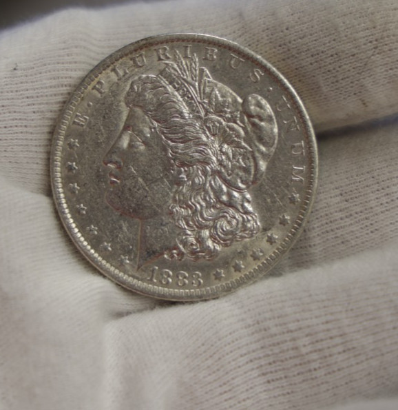 1883 O US Morgan Silver Dollar $1 AU (Cleaned)