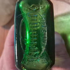 Green kelloggs Glass Miniature Bottle w/ Screw Cap & Embossed Base Marking