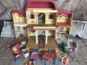 fisher price pink dollhouse