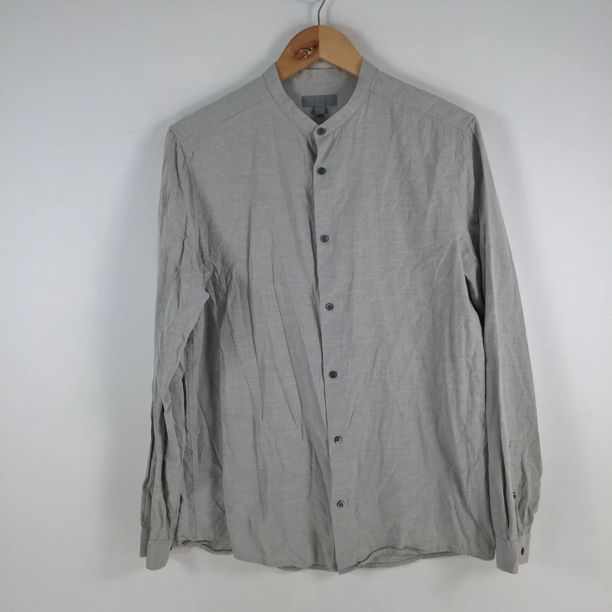 grey collarless shirt