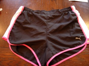 women's black and pink pumas