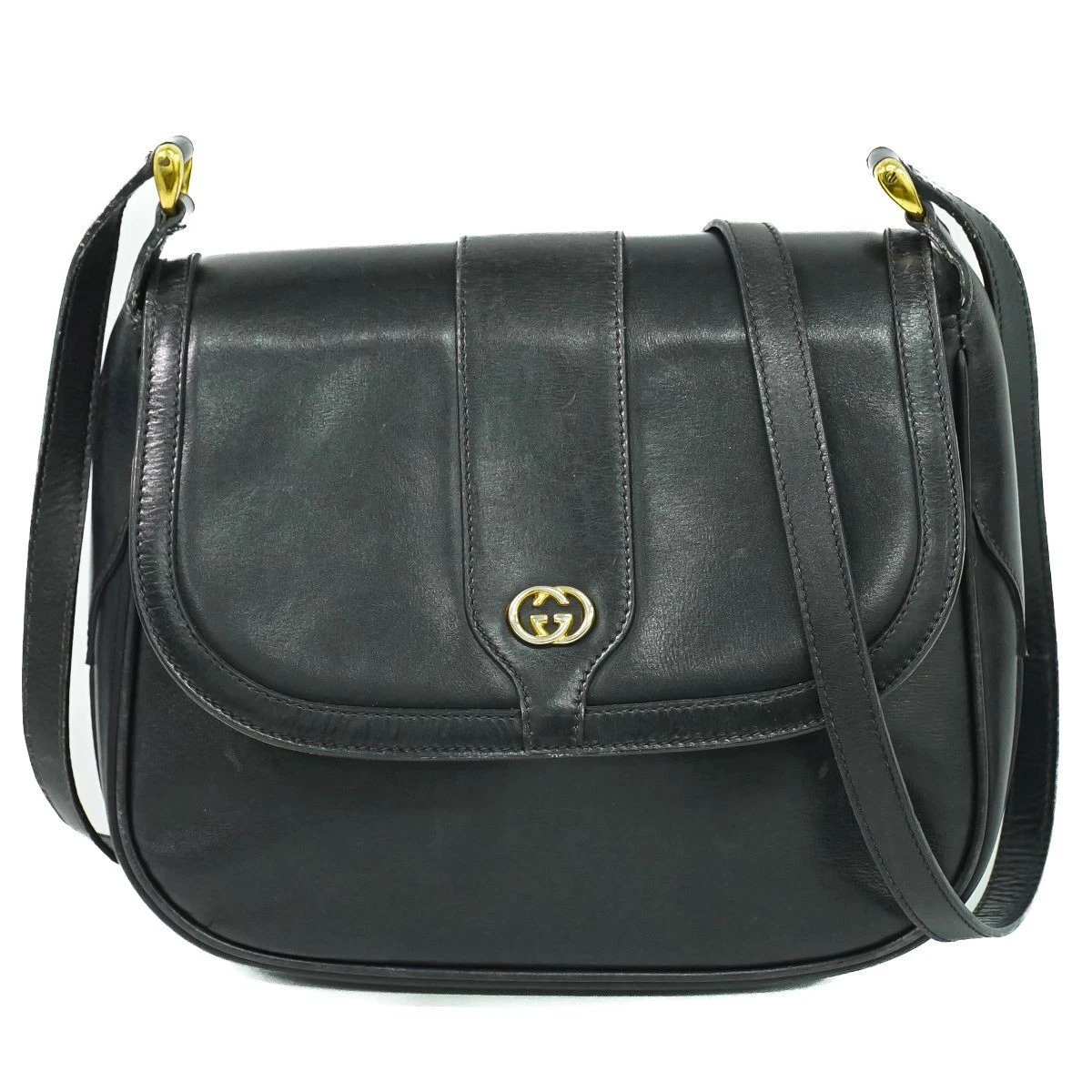 Ancien sac bandoulière Gucci imbriqué G pochette cuir noir
