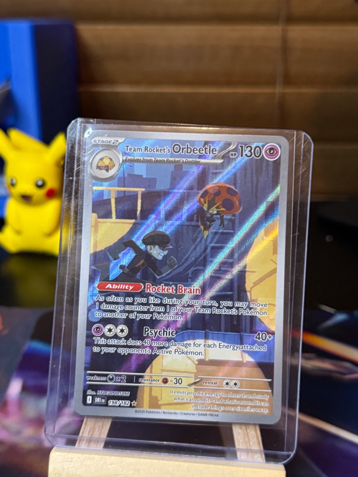 Team Rocket's Orbeetle 198/182 Sv10: Destined Rivals Holo