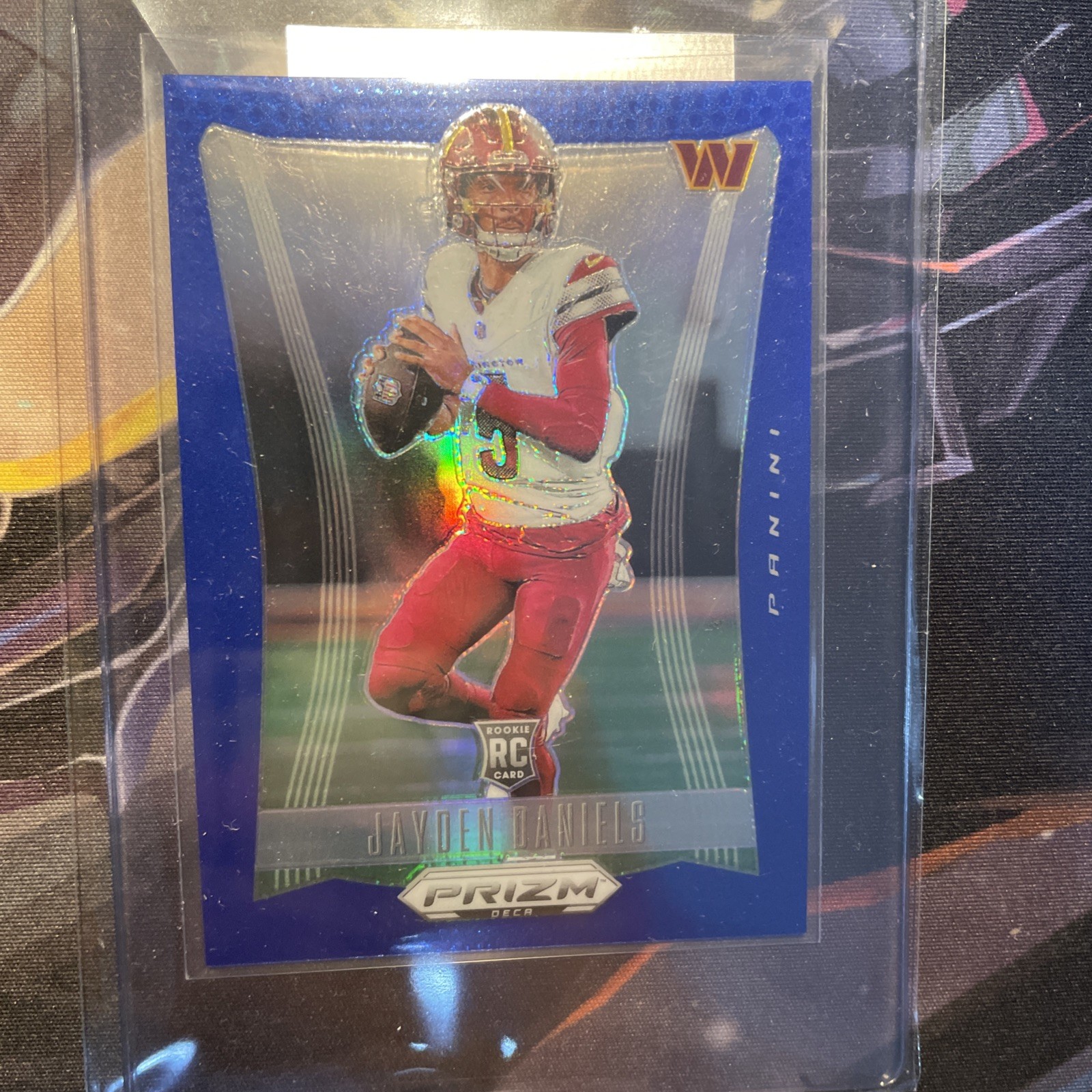 2024 Panini Prizm Deca - Jayden Daniels #295 Blue Prizm /149 (RC)