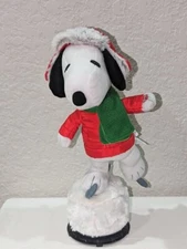 2018 Peanuts Worldwide LLC Animated Snoopy Spins and Plays a Holiday Song 14"