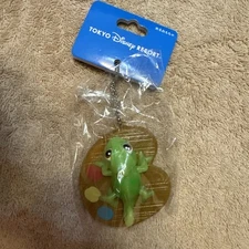 Japan Tokyo Disney Resort Glowing Toy Pascal Fantasy Springs Keychain Badge