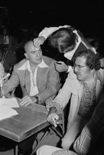 Telly Savalas with unspecified people attending the World Professi- Old Photo