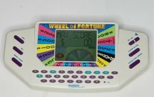 Wheel Of Fortune Handheld Electronic Game by Tiger Electronics 1995 Tested