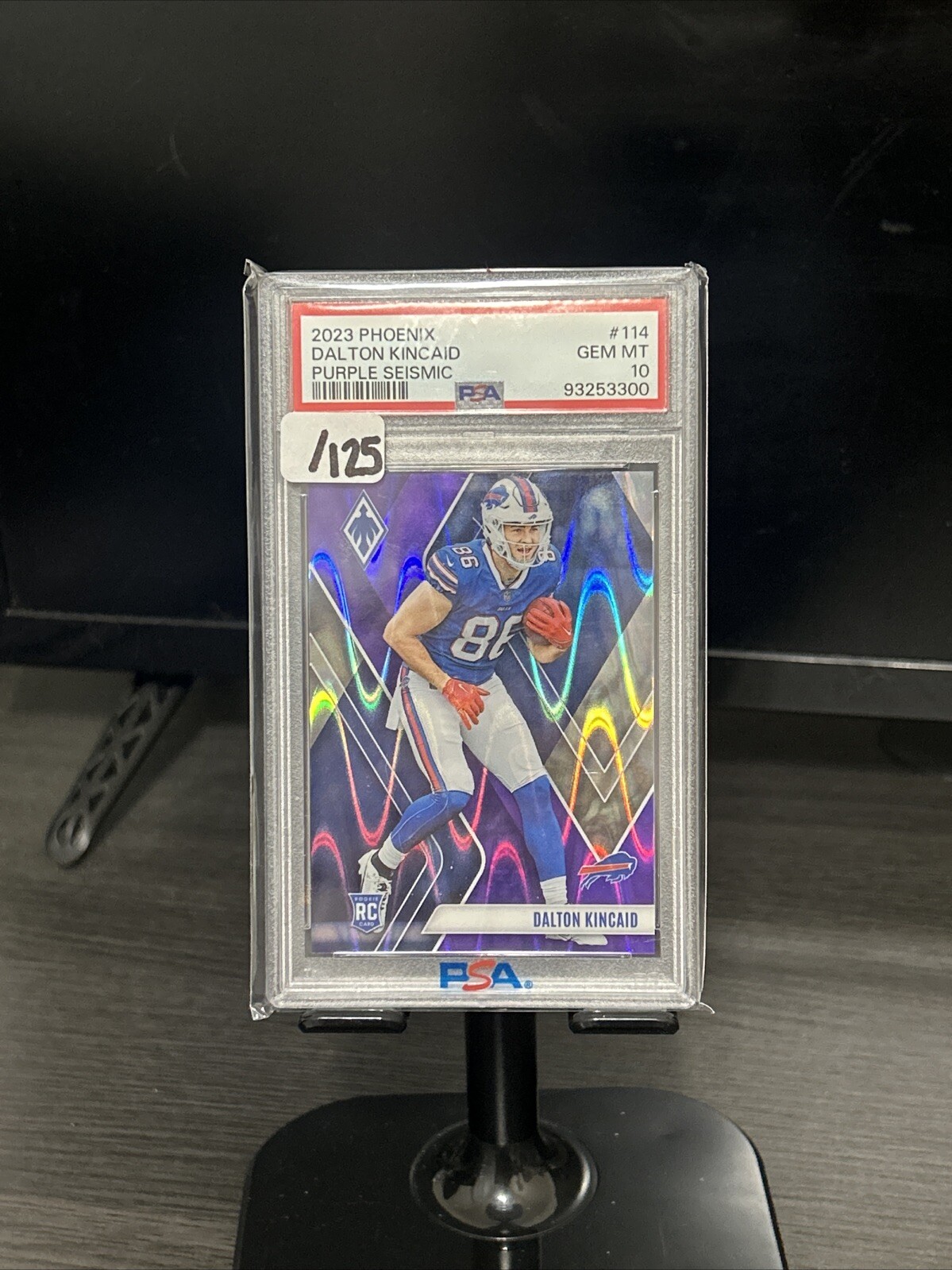 2023 Panini Phoenix - Rookies Purple Seismic #114 Dalton Kincaid /125 (RC)