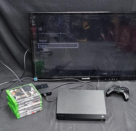 Microsoft Xbox One X with 1 controller, 4TB External Hard Drive, & 9 Games
