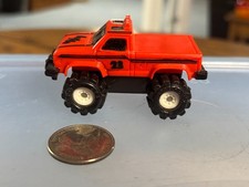 Schaper Stomper Red Ford 4x4 Pickup
