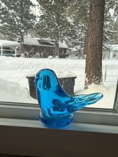 Bluebird of Happiness" art glass figurine, likely created by Leo Ward