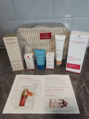 Clarins Kosmetik-Set: Handcreme, Double Serum, Tasche & Pflege (Fast alles NEU)