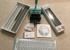 Zutter Bind It All bookbinding machine with binding wires, cover, project CD