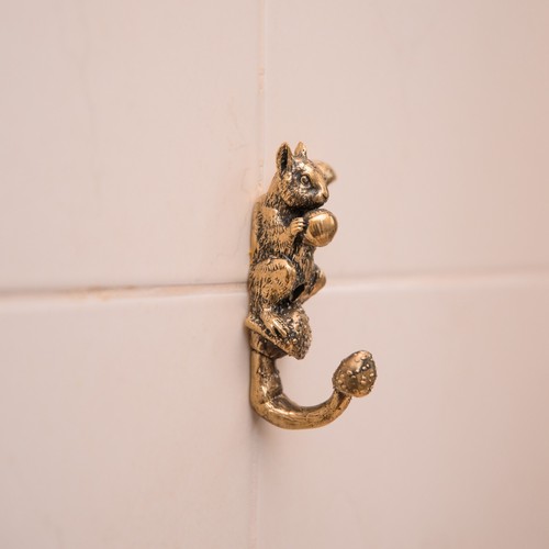 Wall hook in the form of a squirrel sitting on a mushroom and holding a nut - Picture 14 of 16