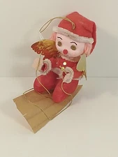 🎄 1972 Vintage Red Flocked Christmas Gold Foil Winged Angle On Sled Ornament