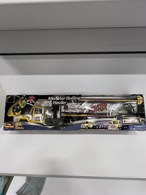 radio-controlled toy truck and trailer set, specifically named ''Monster Rolling