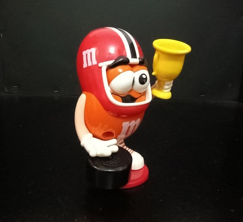 M & M M&M's ORANGE PEANUT RACING CHAMPION w/ TROPHY 6" FIGURE CANDY DISPENSER - Picture 3 of 8
