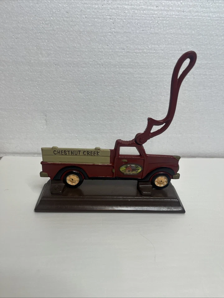 Vintage Cast Iron Chestnut Creek Country Red Farm Truck Nut Cracker Wooden Stand - Image 2 of 3