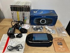 Boxed Sony PSP Giga Pack 1003 Series Handheld Game Console in Black with games.