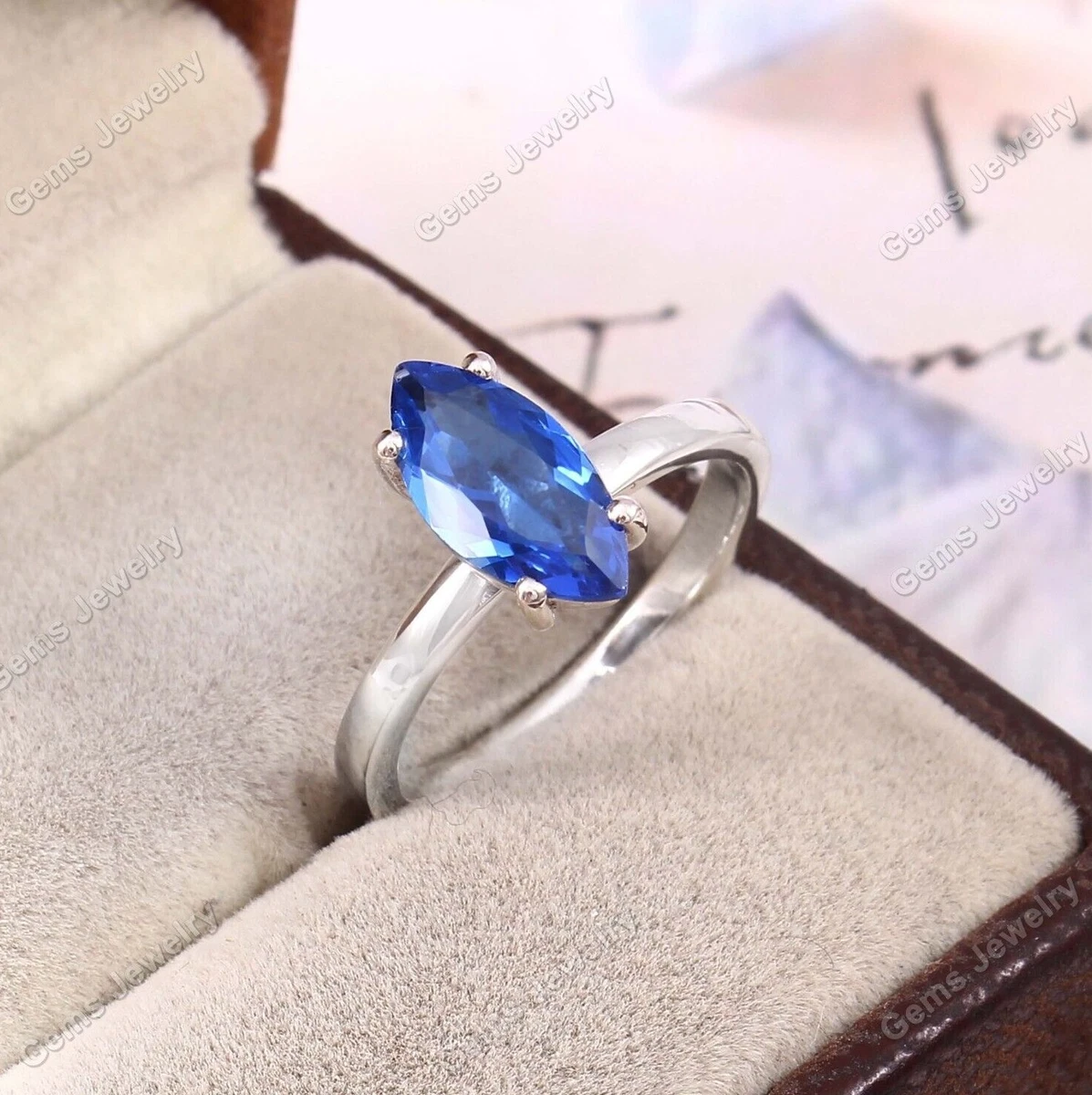 Marquise cut gemstone best sale rings