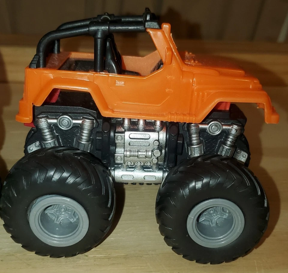 2 juguetes Monster Truck tapas intercambiables acción de empuje rodante 4,5" x 4,5" Foto 4 de 4