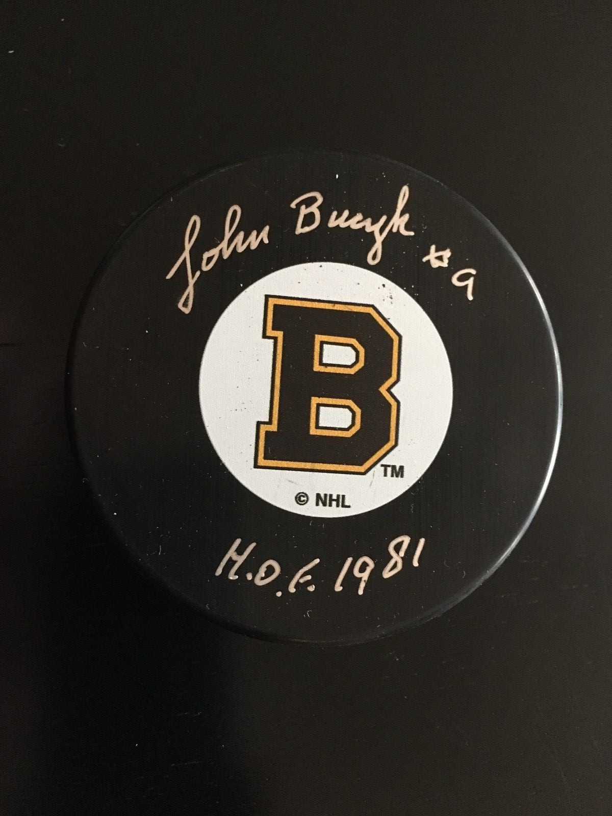 JOHN BUCYK AUTOGRAPHED ORIGINAL SIX BRUINS PUCK W/ "HOF 1981" INSC. JSA