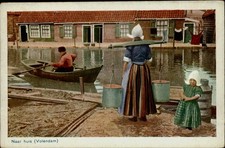 Traditional Dutch life costume Naar huis Volendam woman carrying water PC