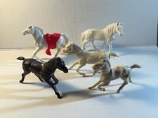 Lot of five assorted plastic Western horses. Five total as shown