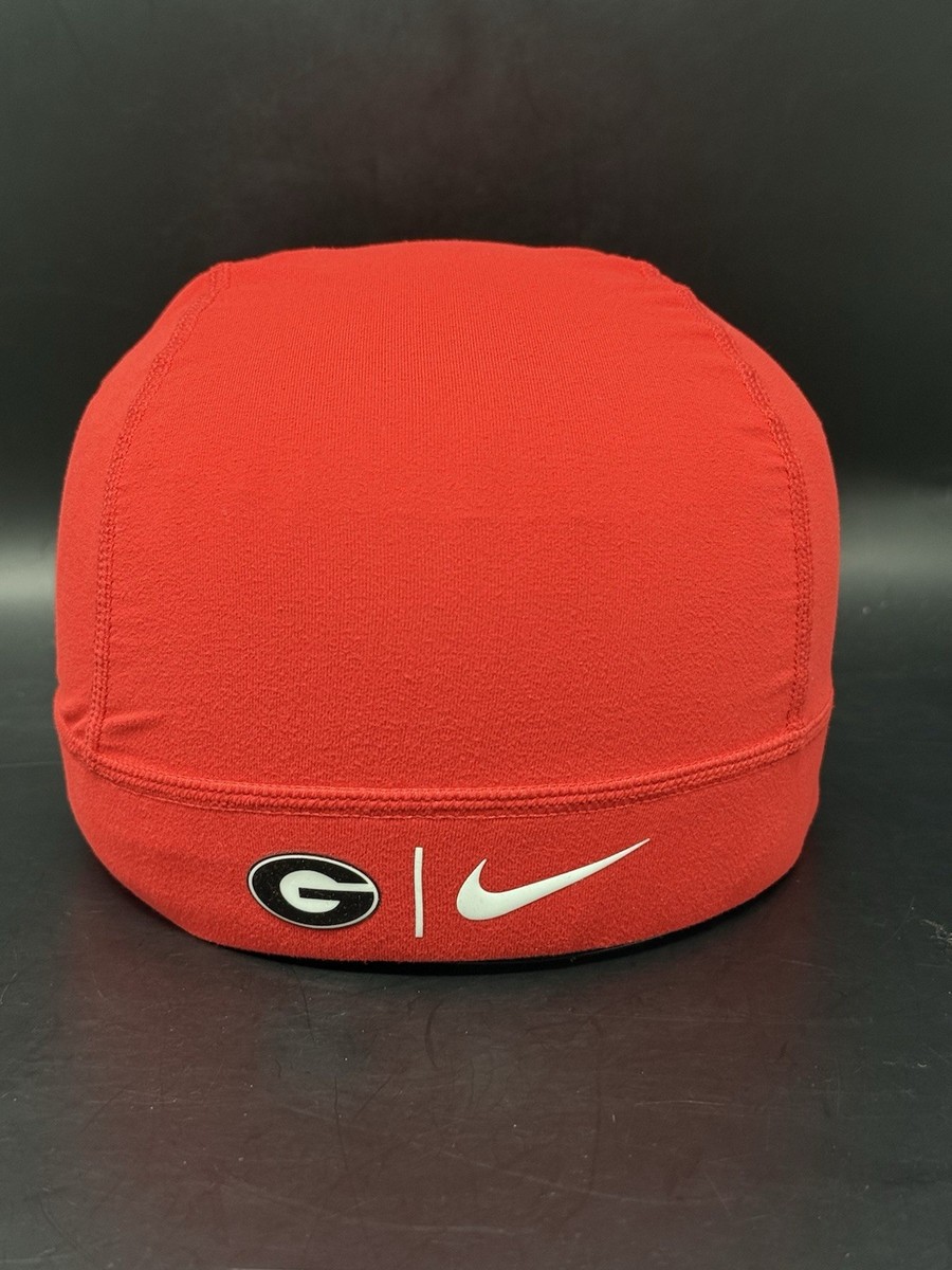 orange nike skull cap