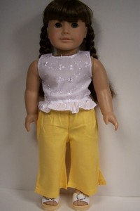 white top yellow pants