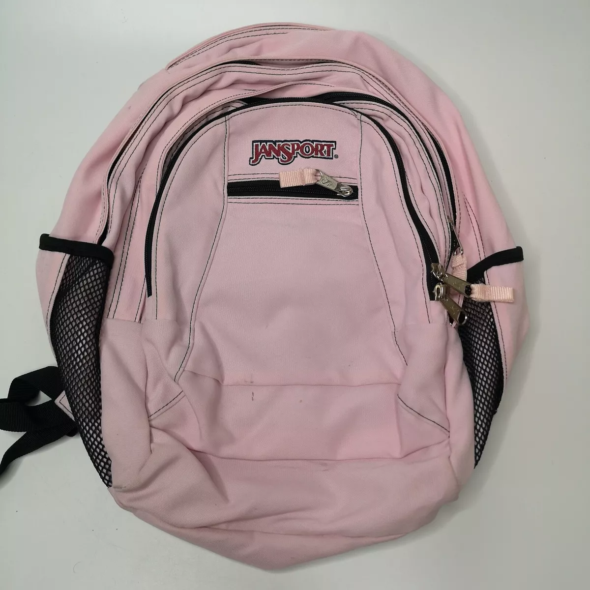 Light pink jansport backpack sales