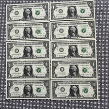 Dix billets consécutifs de 1,00 $ 