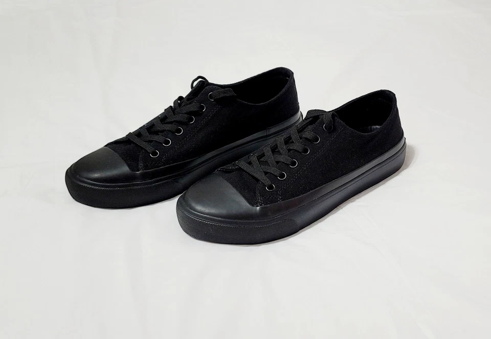 Zapatillas deportivas para hombre Calvin Klein talla 7,5 M negras de lona parte superior baja con cordones punta redonda Foto 3 de 4