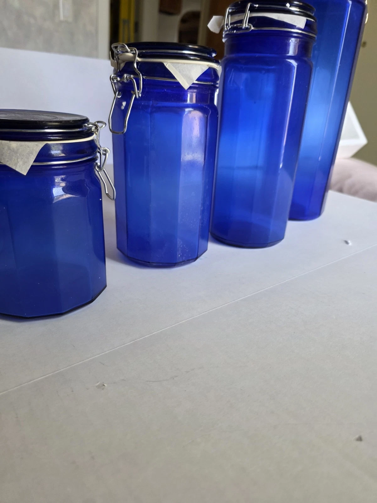 Set Of 4 Cobalt Blue 12 Panel Glass Canisters With Wire Latch Lids Open Box New